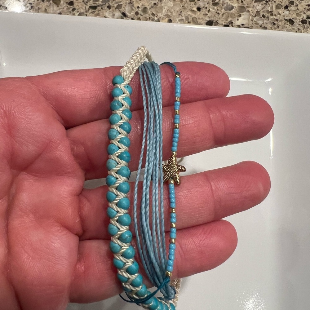 Pura Vida Blue and Gold Bracelet with Intricate Design